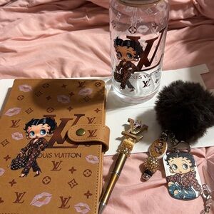 Brown and Tan Betty Boop 5 piece notebook and accessory set.